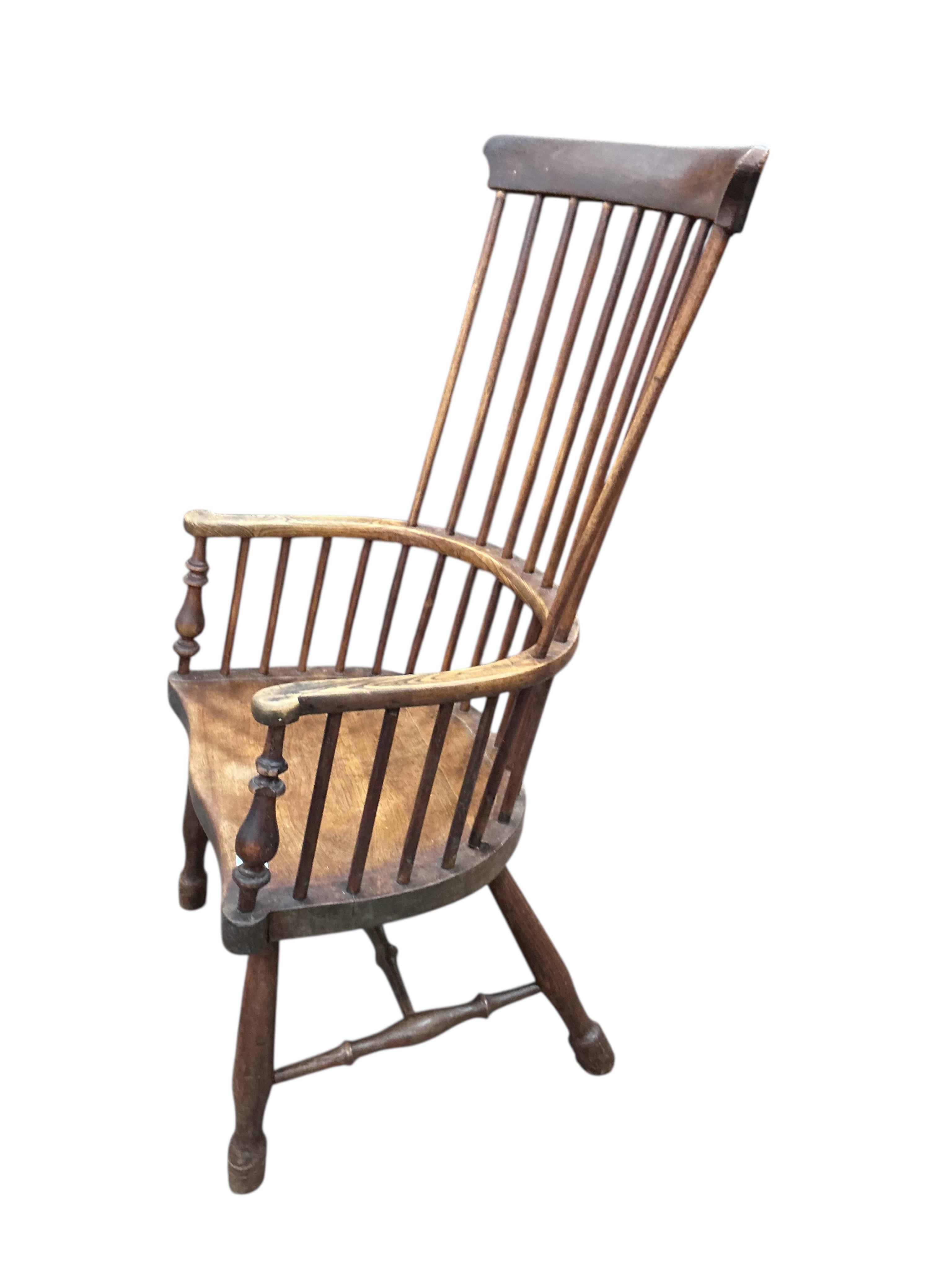 A late 19th century Windsor comb back armchair, width 59cm, depth 40cm, height 113cm